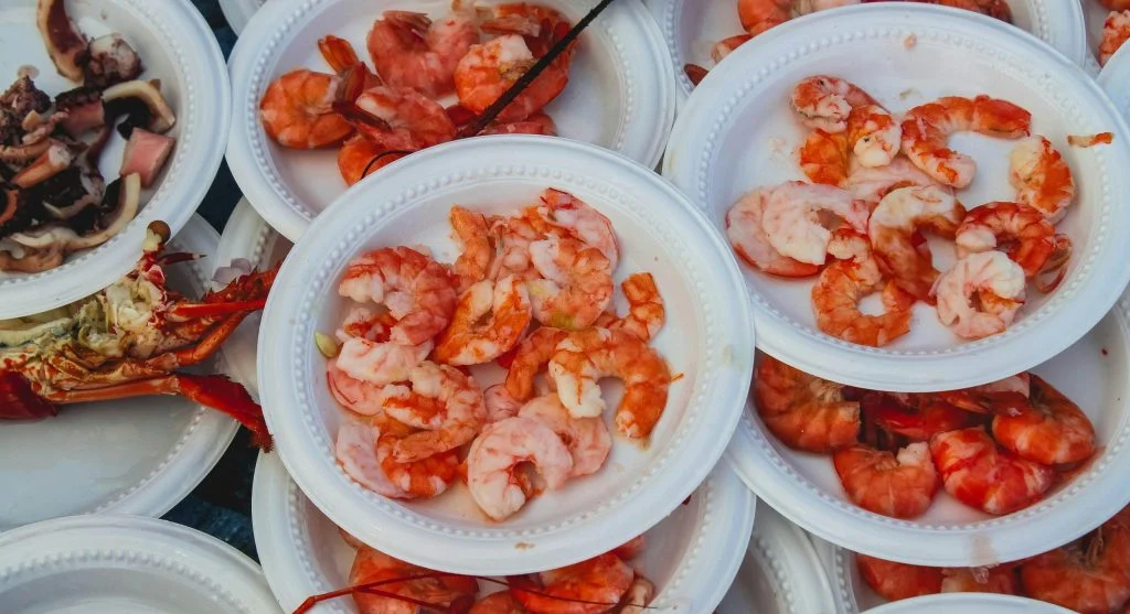 Coastal seafood market with fresh fish and luxury food stalls
