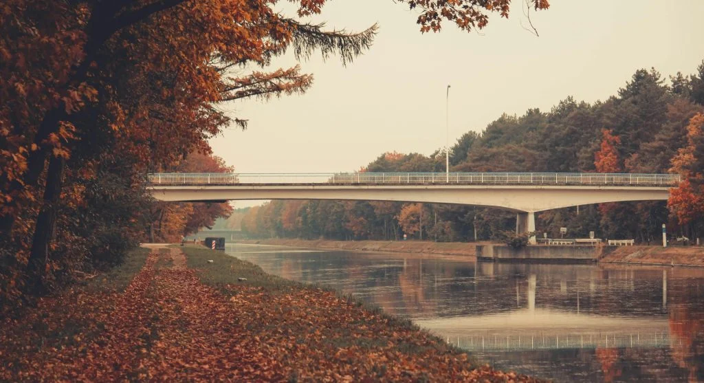 Cyclists riding along a European canal