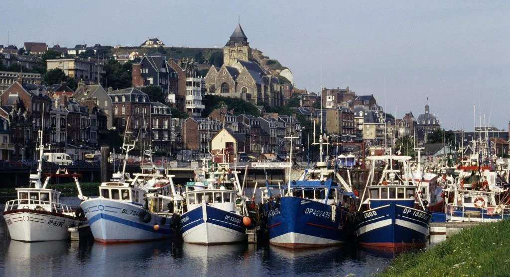 Scenic European waterways with boats and lush greenery