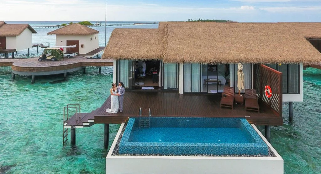 Floating eco resort with camera equipment and tourists