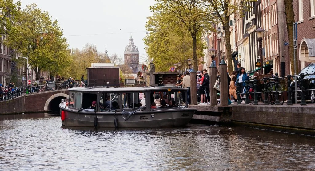 People watching wildlife from electric canal boats