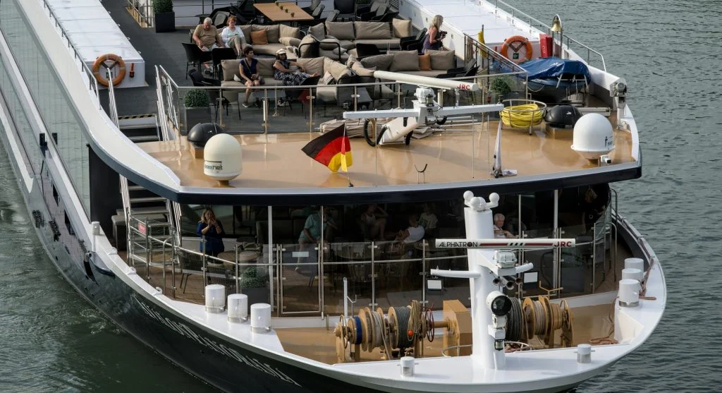 Passengers relaxing on a luxury river cruise ship