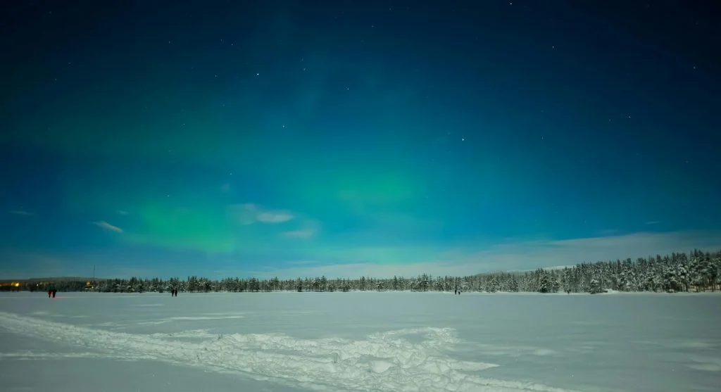snowy landscape near glass igloo resort
