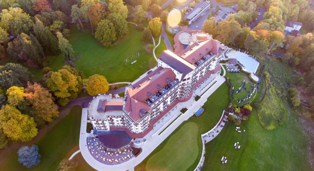 Floating luxury hotels surrounded by autumn foliage