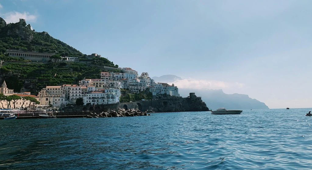 Luxury seaside travel destination with cliffside villages and crystal clear waters