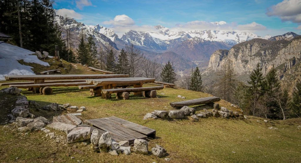 People hiking and practicing yoga at a mountain resort