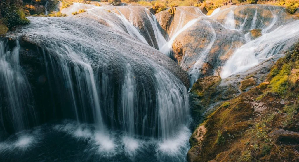 Seasonal scenery near waterfall retreat destinations