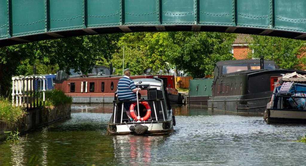 Family enjoying outdoor activities during a canal vacation