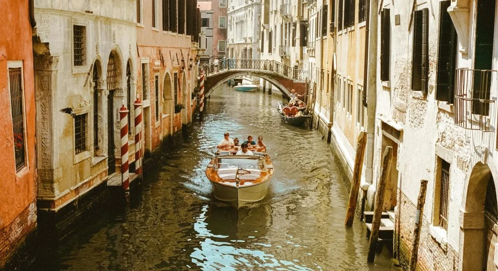 Family enjoying scenic European canal boat tour