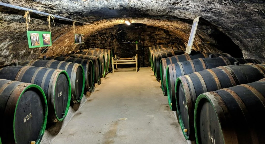 Wine glasses and bottles on a canal boat in Europe