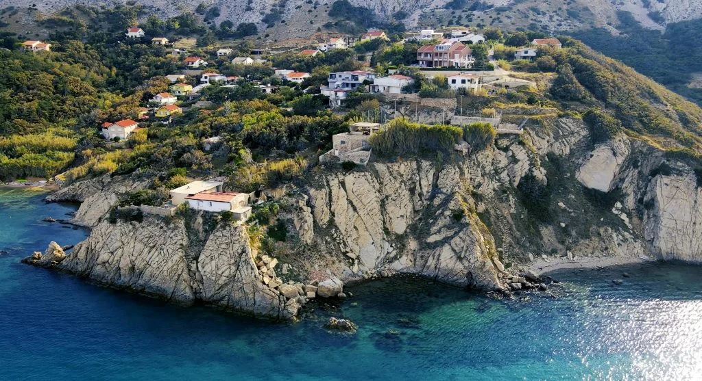Coastal village on a cliffside with scenic views of the sea