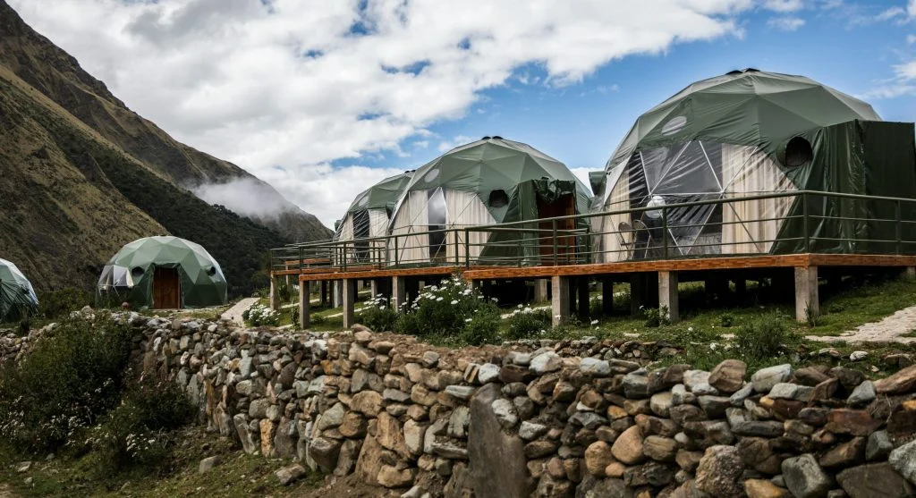 Scenic view of outdoor activities near luxury glass dome suites