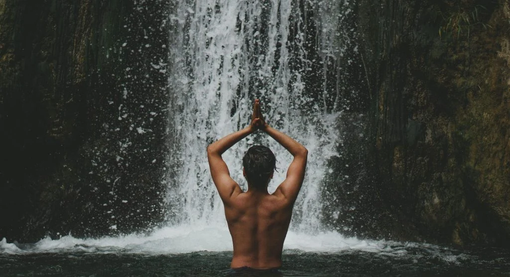 wellness activities near waterfall